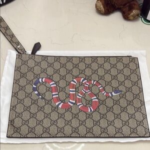 Beige Clutch with Red and Blue Snake Design